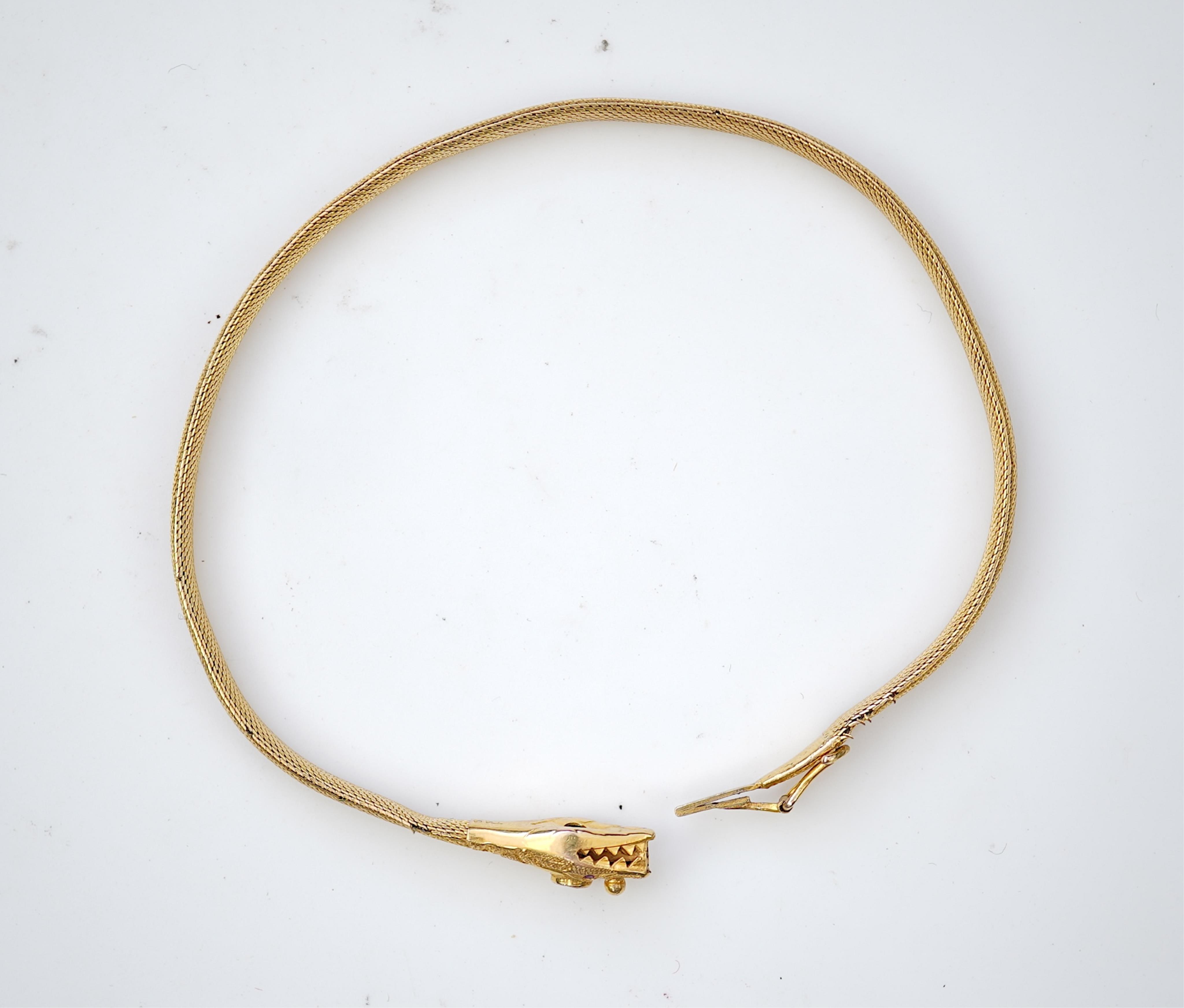 A Victorian gold, ruby and sapphire bracelet, mid 19th century